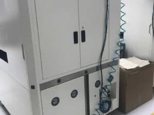 Back of a 2014 TRI TR7500 SIII AOI machine.