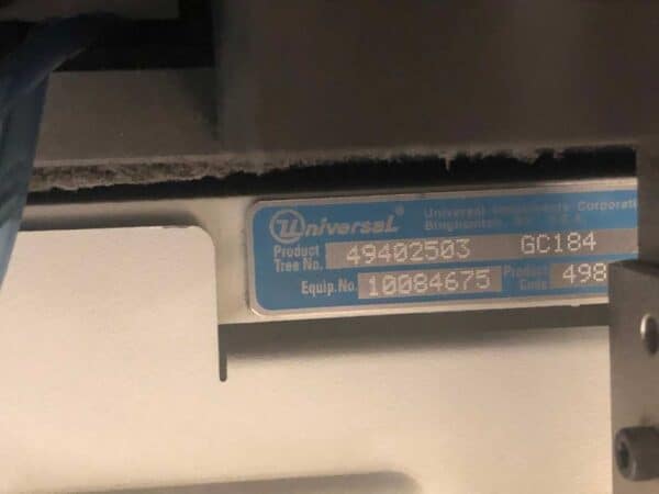 Photo of the serial plate on a 2005 Universal Genesis GI-14D smt pick and place machine.